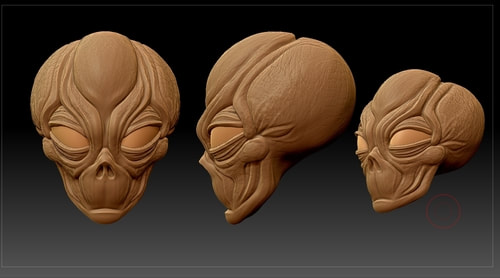 Alien heads in three views.